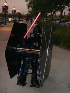 Darth Vader outfit built around a wheelchair. 